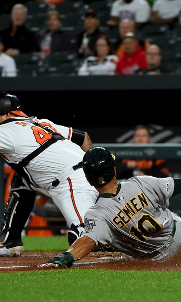 Khris Davis hits 2 HRs, Chris Davis hitless, A’s thump O’s